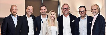 Caption: The management team of Ecclesia Credit GmbH (from left): Matthias Bühler, Mark Sieber, Stefan Vogel, Lisa Gille, Markus Moritz, Sven Coels, and Jörg Kowalewski.